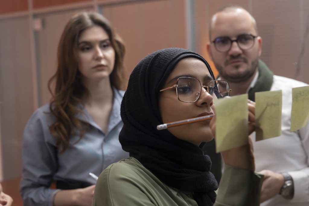 Student brainstorming during group workshop